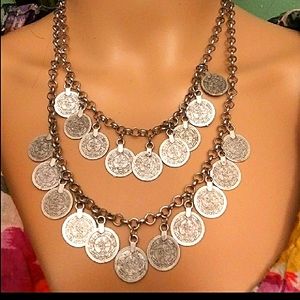Double strand coin necklace.